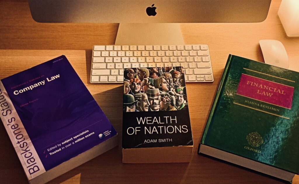 desk featuring three books